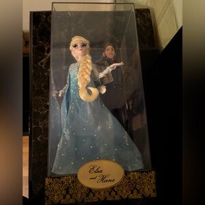 Disney store exclusive Elsa and Hans collectible dolls